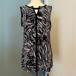 Women’s Liz Claiborne Tank. New with tags. Size small. Black and white in color.
